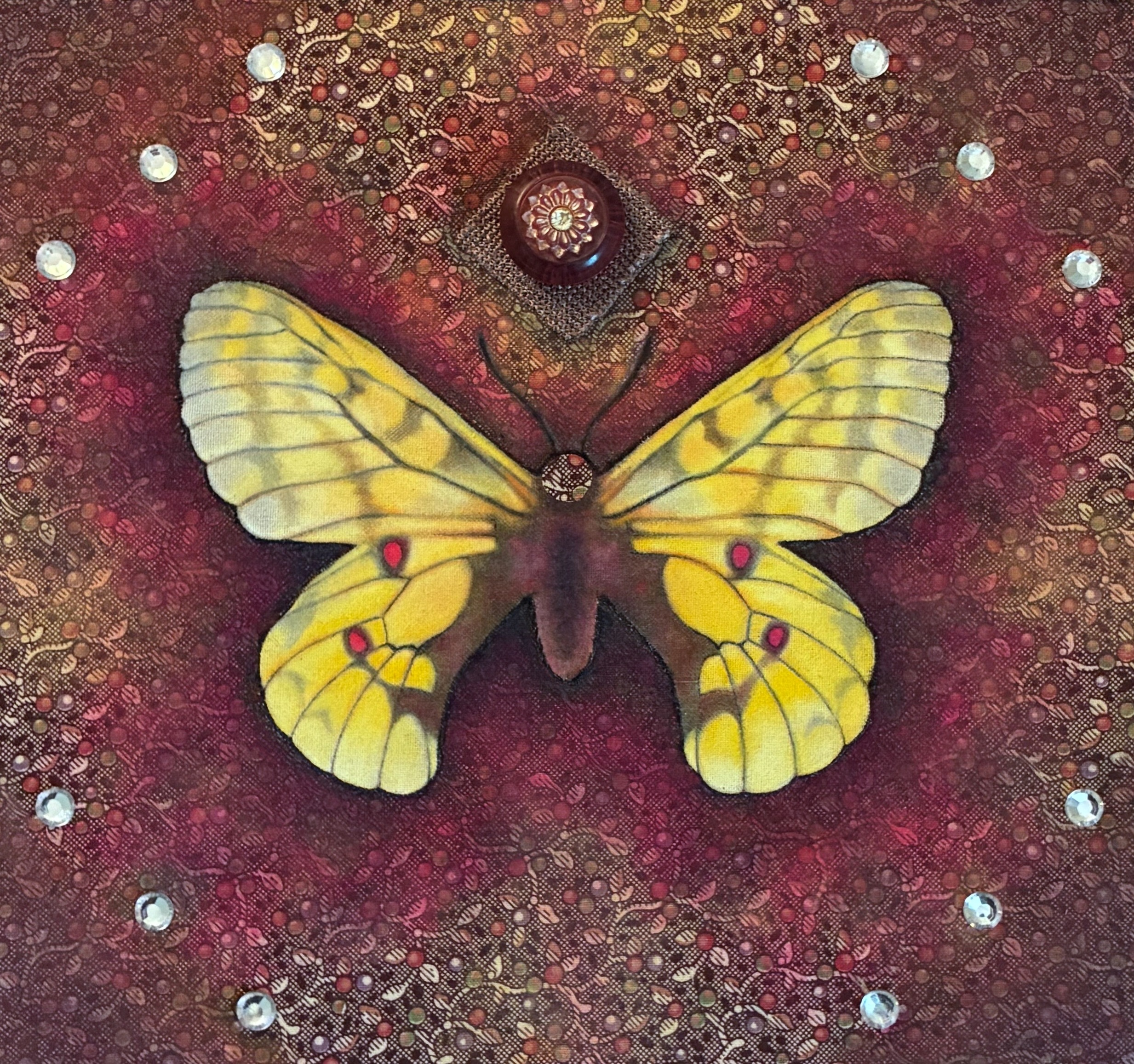 Textile art collage of a Parnassius eversmanni butterfly